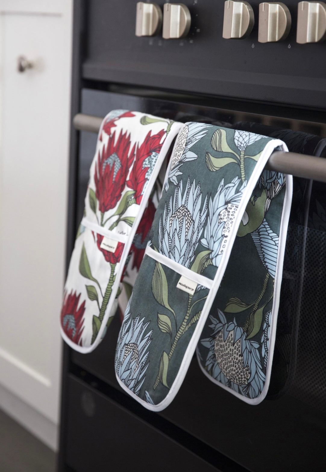 Assorted joined oven gloves