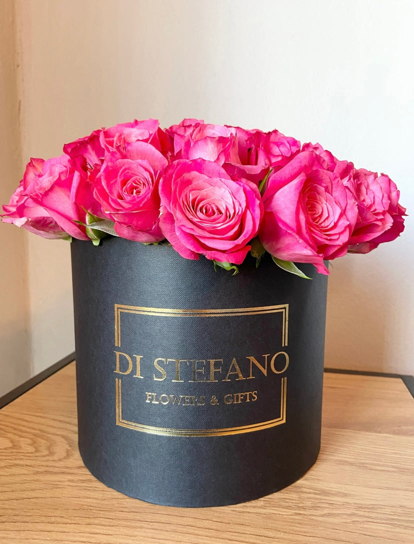 Large hatbox rose arrangement pink